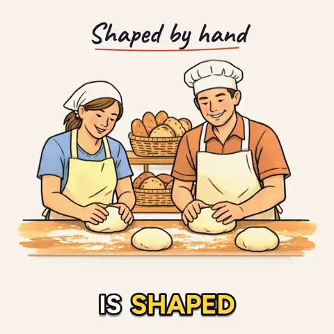 Un anuncio cuadrado de una panadería: dos panaderos dan forma al pan bajo el título «Shaped by hand».